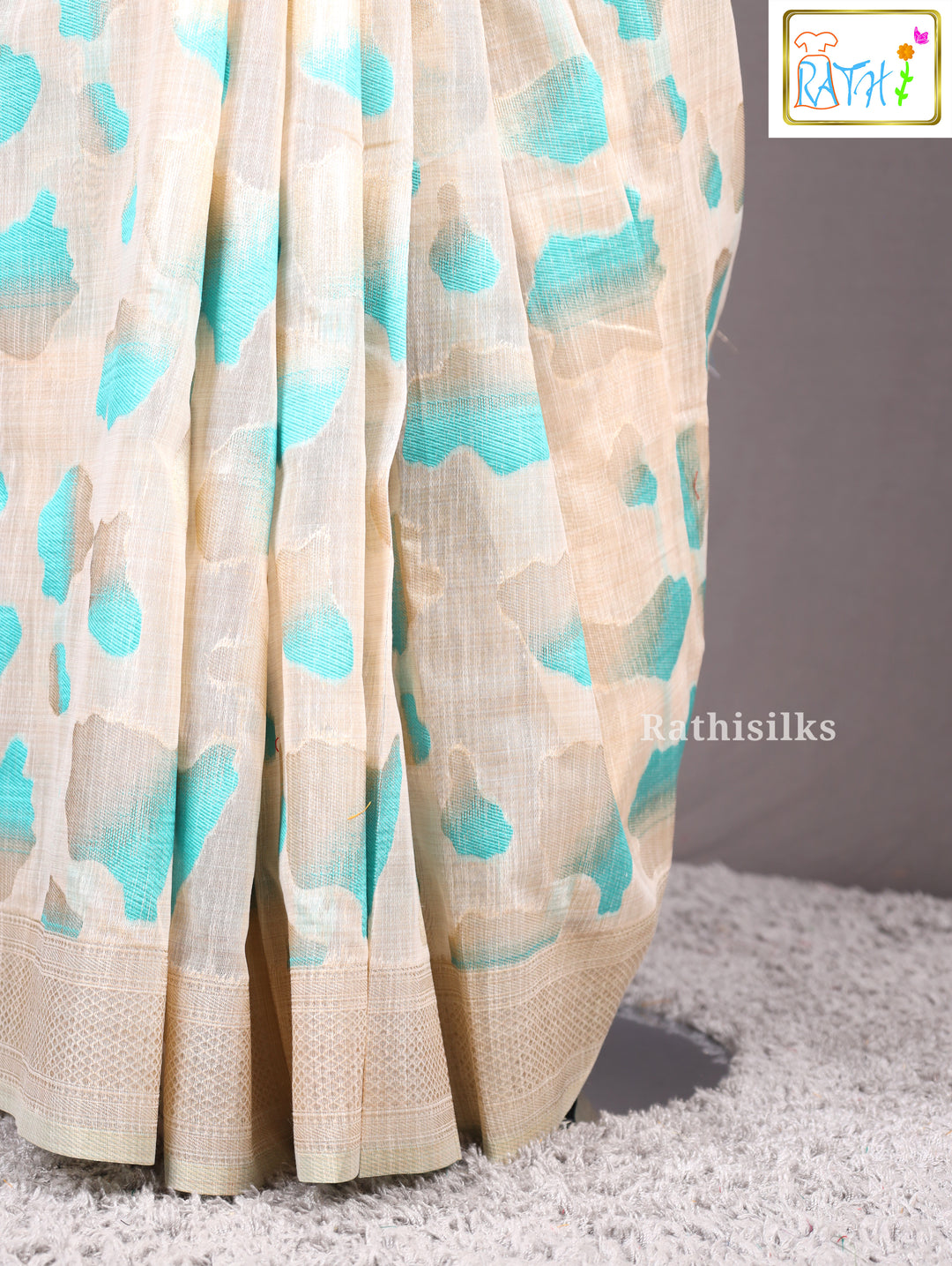 Elegant Cream and Aqua Synthetic Saree
