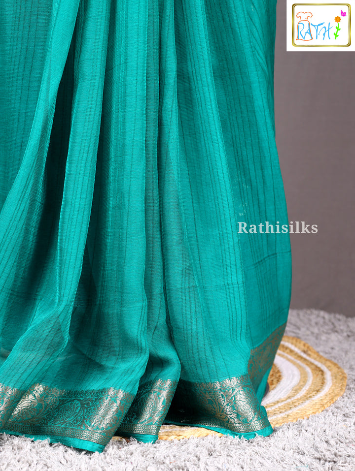 Teal Green Semi Soft Silk Saree