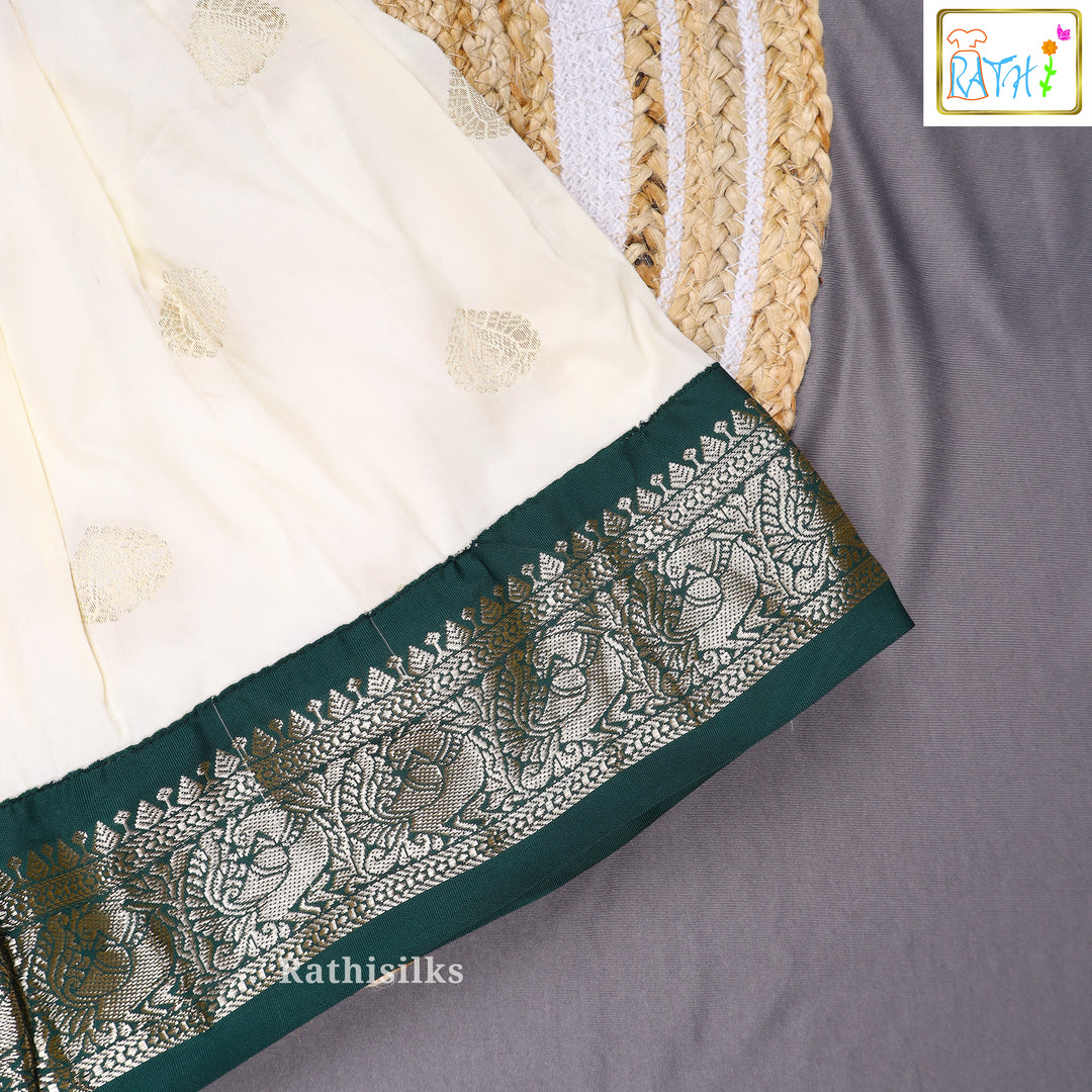 Bottle Green Art Silk Top with Cream Art Silk Pavadai Set