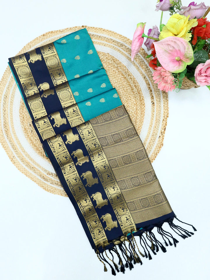 Kanaga — Peacock Green Tana Art Silk Saree
