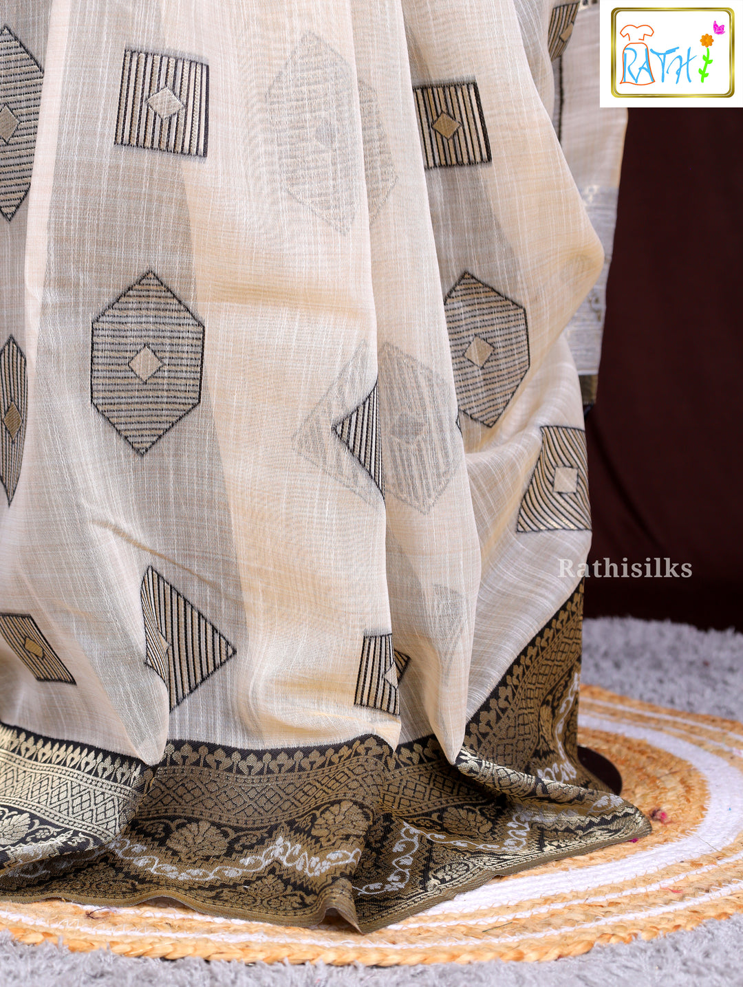 Elegant Cream and Black Geometric Woven Saree
