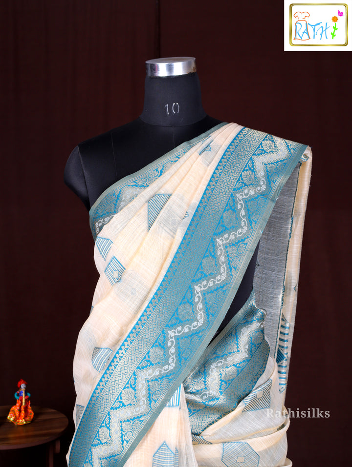 Cream Synthetic Saree with Woven Teal Geometric Design