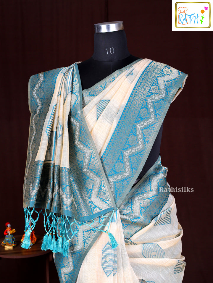 Cream Synthetic Saree with Woven Teal Geometric Design