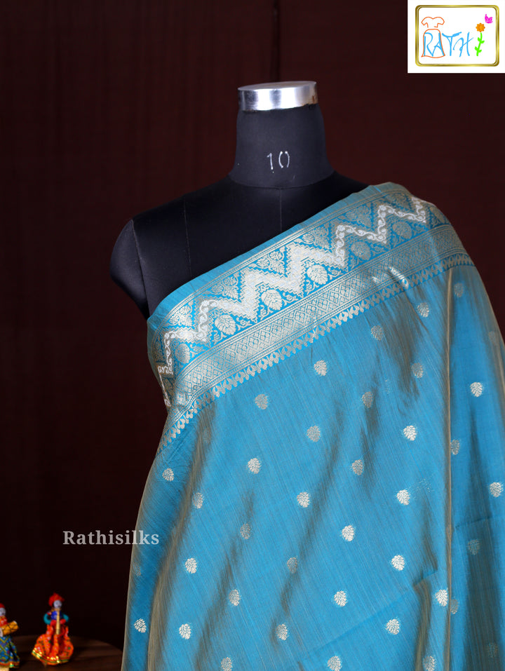 Cream Synthetic Saree with Woven Teal Geometric Design