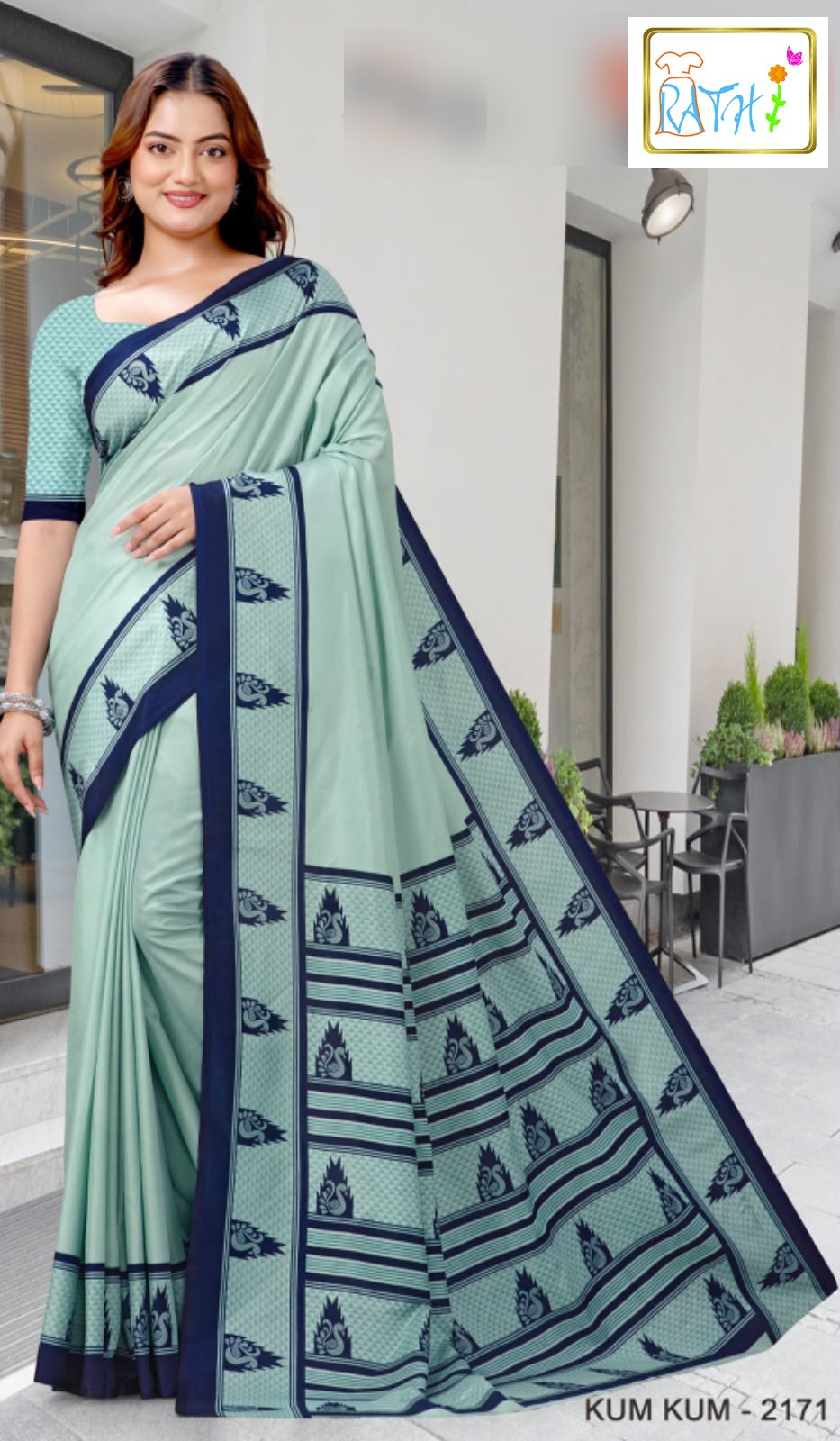 Pallavi — mint green uniform saree with navy border, Rathi Silks