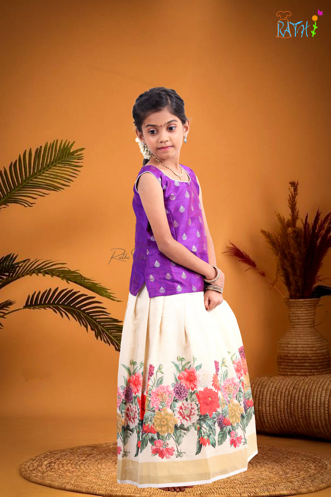 Elegant Purple Brocade Blouse & Ivory Floral Skirt Pavadai Set