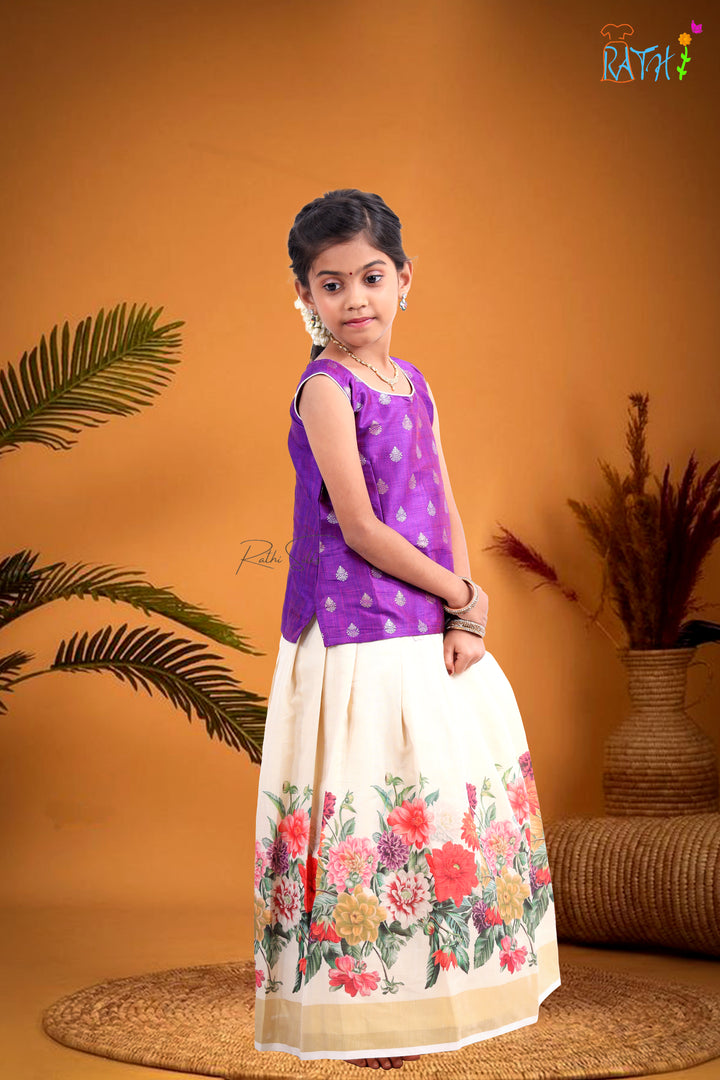 Elegant Purple Brocade Blouse & Ivory Floral Skirt Pavadai Set
