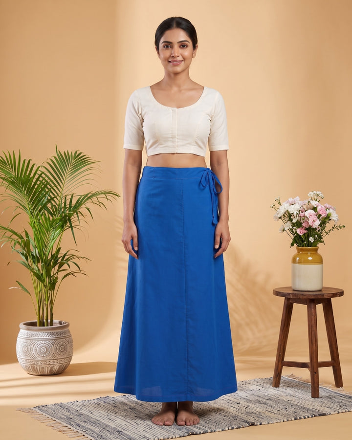 Blue cotton saree petticoat, model with background #colour_blue
