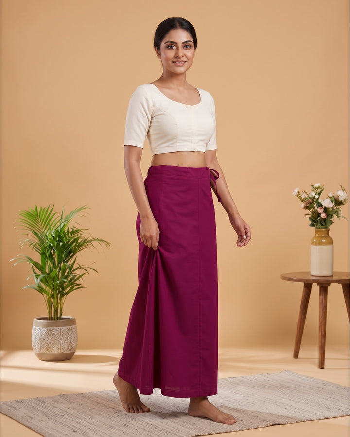 Dark Pink cotton saree petticoat, model with background #colour_dark-pink