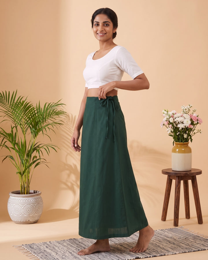 Green cotton saree petticoat, model with background #colour_green