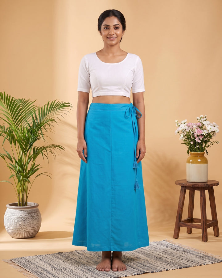 Sky Blue cotton saree petticoat, model with background #colour_sky-blue